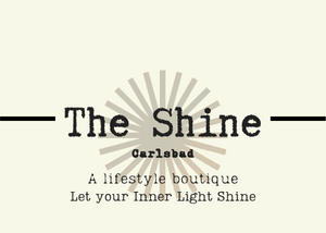 The Shine Carlsbad logo