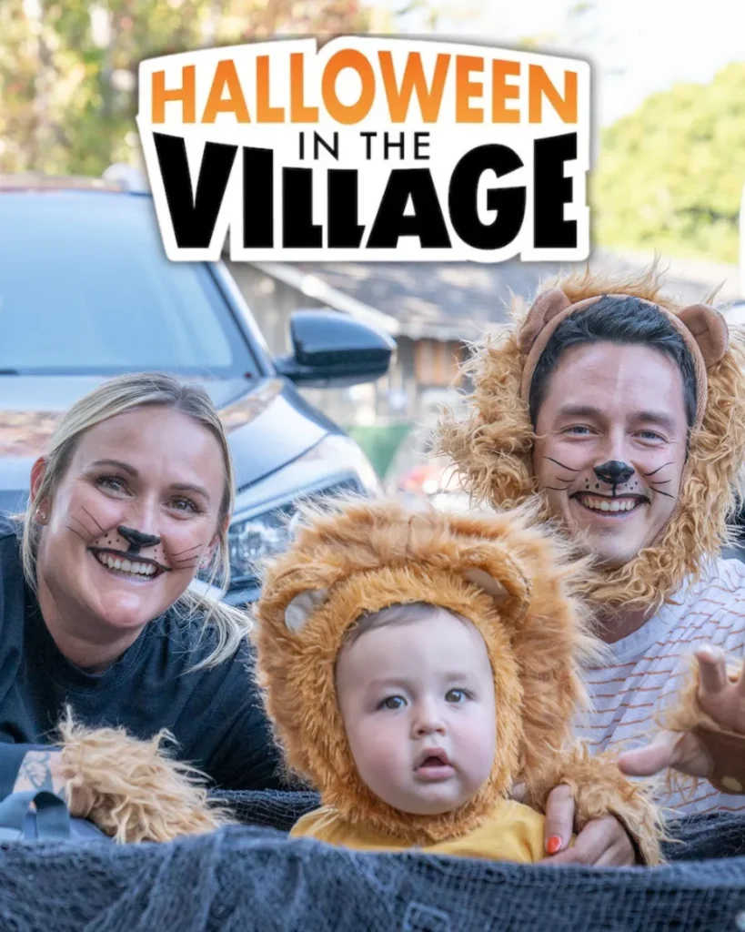 Family dressed in lion costumes for Carlsbad Village Association's Annual Halloween in the Village.